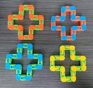 Four colorful 24-segment wacky track fidget toys shown in a cross-shaped arrangement.