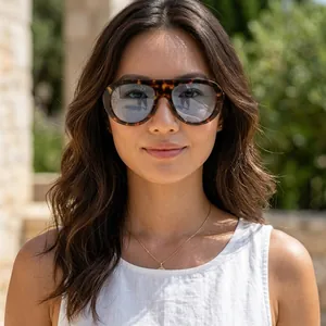 Stylish women's aviator sunglasses with tortoiseshell frame and ocean blue lenses