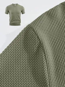 Macro shot of breathable waffle texture on olive green men's sports t-shirt