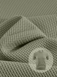 Macro view of olive green breathable waffle knit fabric for men's T-shirt.