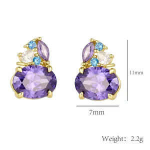 Detailed view of purple oval zircon earrings with 11mm height and 7mm width dimensions.