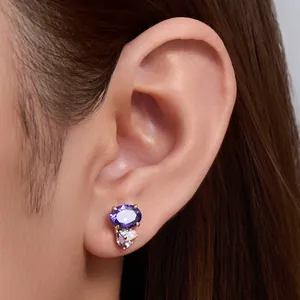 Elegant S925 sterling silver purple oval zircon stud earrings worn on female ear lobe
