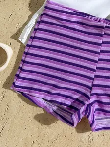 Close-up detail of purple striped terry cloth bikini bottom with a soft, cozy texture