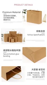 Detail view of brown kraft paper gift bags showing reinforced handles and bottom