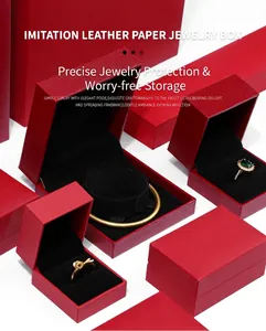 Coffrets à bijoux de luxe en similicuir rouge avec doublure en velours noir.