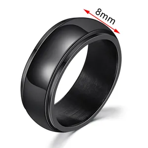 Detail view of 8mm wide black stainless steel spinner ring for men with polished surface
