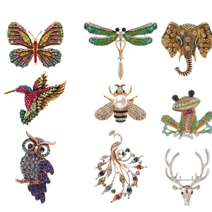 Set of nine vintage animal brooches featuring rhinestone butterfly bee and owl pins