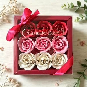 Detail view of a luxury gift box with nine gradient pink and red soap roses.