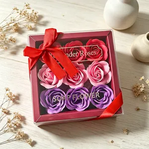 Detailed view of the rose soap flower gift box with elegant red ribbon bow