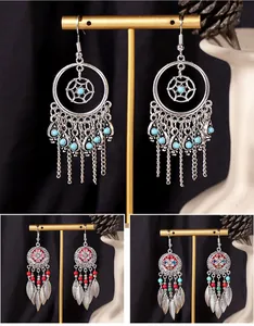 Vintage Bohemian long drop tassel earrings with colorful beads and leaf pendants.
