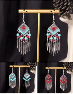 Bohemian vintage long tassel earrings featuring geometric beads and antique silver finish