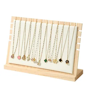 Multi-hook wooden necklace display stand featuring an elegant white velvet padded board