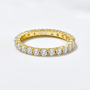 Detailed macro view of gold-plated sterling silver eternity ring with ice flower cut stones