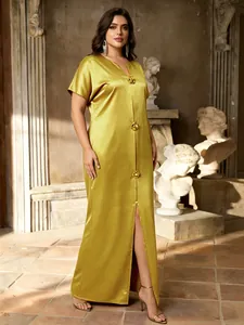 Elegant mustard satin maxi dress with 3D floral accents and a high front slit detail.
