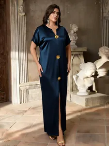 Navy blue satin maxi dress featuring elegant gold 3D flower buttons and front slit
