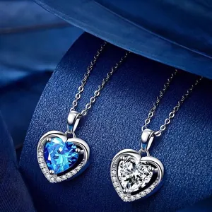 Elegant Heart of the Ocean heart-shaped crystal necklaces in blue and white colors