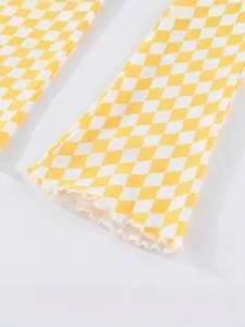 Yellow and white checkered flared leggings for girls with delicate ruffle hem detail