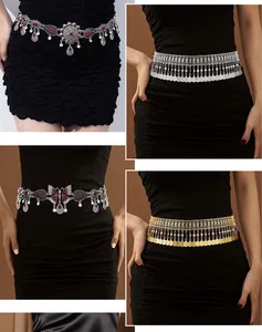 Detailed view of four vintage metal waist chains with coin and butterfly charms.