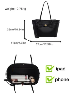 Professional black leather tote bag for work featuring large capacity and size details