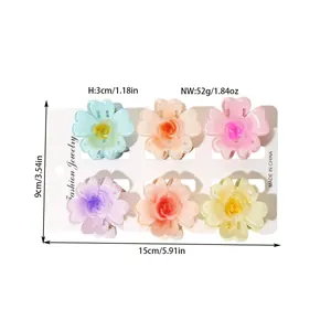 Detail view showing 6 colorful translucent flower hair clips with size and weight specs