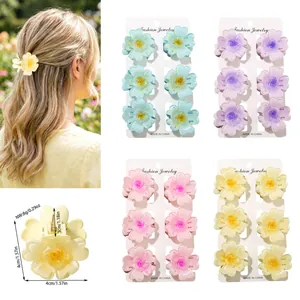 Detailed view of plumeria flower claw clips in various colors with size measurements