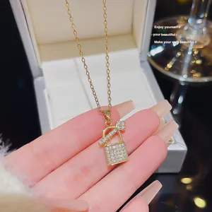 Elegant gold lock pendant necklace with sparkling rhinestones for a luxury look