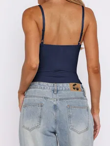 Rear view of a sexy navy blue Y2K style camisole top with adjustable thin straps