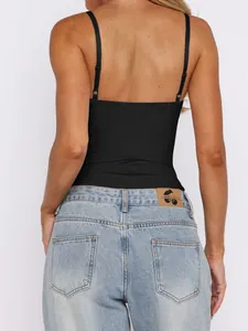 Back view detail of a black Y2K style camisole top with thin adjustable straps