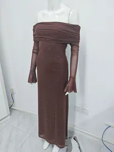 Detailed view of elegant brown glitter mesh maxi dress with off-the-shoulder bell sleeves