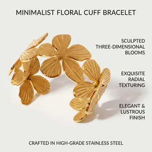 Detailed view of a golden floral cuff bracelet with sculpted blooms and radial texture