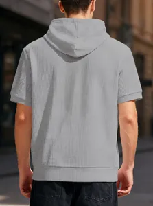 Men's grey waffle-knit hooded short-sleeve T-shirt showing back view texture details