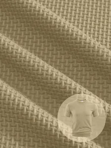 Macro detail of breathable seersucker fabric on a men's khaki short sleeve T-shirt.