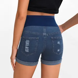 Maternity denim shorts with elastic belly support band and ripped back pockets