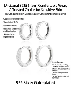 Close-up detail of S925 sterling silver hoop earrings with shimmering cubic zirconia inlay