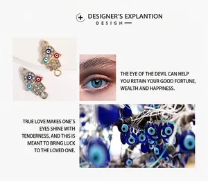 Detail showing two Hamsa hand charms with evil eye motifs and sparkling rhinestones for DIY jewelry.
