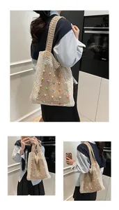 Detailed side and front views of a beige knitted tote bag with colorful pearl accents