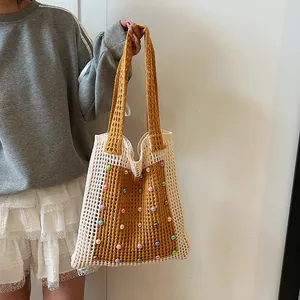 Casual handmade crochet knit tote bag with colorful beads and mustard yellow straps