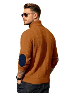 Back view of men's orange cable knit turtleneck sweater with navy elbow patches.