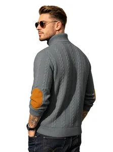 Detail view of a grey men's turtleneck cable knit sweater featuring brown elbow patches