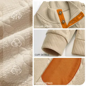 Detailed view of men's jacquard Henley sweatshirt with stand collar and rib cuffs