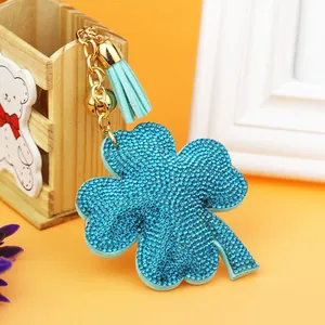 Sparkling blue rhinestone four-leaf clover keychain with tassel for bag charm decoration