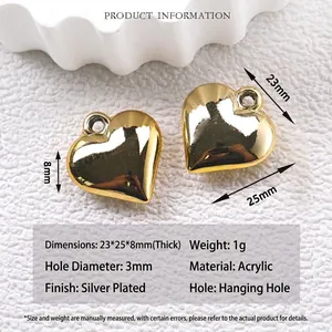 Detailed view of gold acrylic heart pendant with dimensions 23x25x8mm and 3mm hole