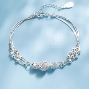 S925 sterling silver triple strand bracelet featuring delicate frosted round beads