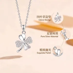 Detail view of a S925 sterling silver four-leaf clover pendant necklace with zircons