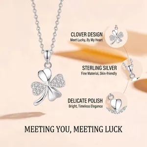 Detail view of a S925 sterling silver four-leaf clover pendant necklace with zircons
