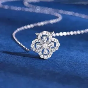 Detailed macro view of S925 sterling silver four-leaf clover pendant with CZ stones