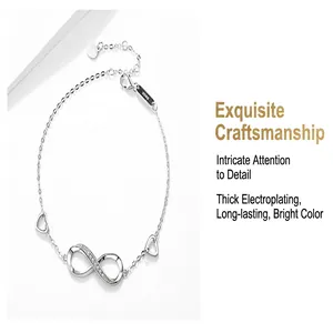 Detail view of S925 sterling silver bracelet featuring infinity symbol and heart charms