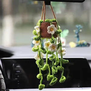 Detailed view of handmade crochet potted plant car rearview mirror hanging ornament
