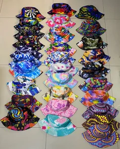 Wide collection of colorful tie-dye and graffiti patterned reversible bucket hats for summer