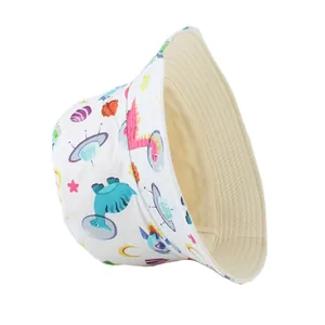 Side view of white kids bucket hat with colorful dinosaur and space cartoon prints